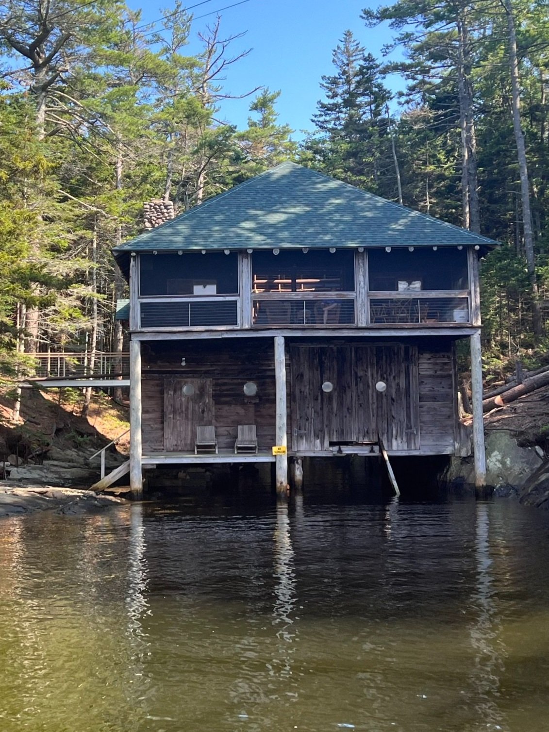 Mr. Brown’s Boathouse sitting atop the tidal waters of Long Cove