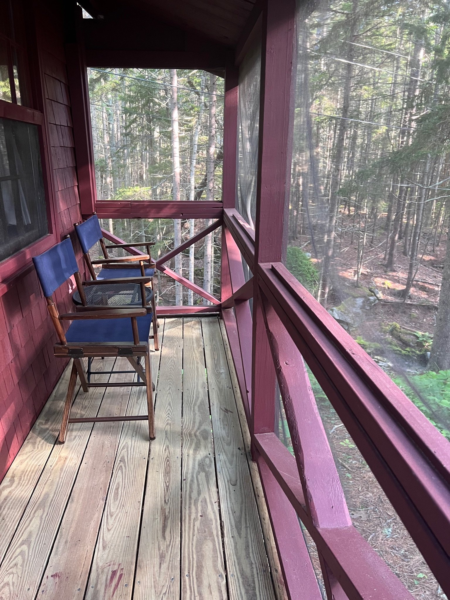 Screened porch overlooking the ravine and stream